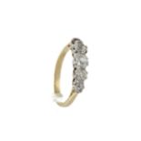 A 18ct gold and diamond five stone ring. The graduated old-cut stones approx. 1.