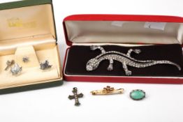 An early 20th century gold brooch and a collection of costume jewellery.