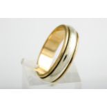 A modern 9ct bi-colour gold wedding band.