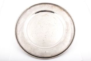 A Continental .830 standard round salver with a fine beaded band.