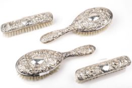 Two pairs of vintage silver mounted brushes.