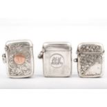 Three Victorian and later silver vesta or match cases.
