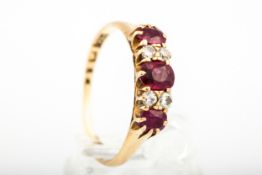 An early/mid-20th century gold, ruby and diamond dress ring.