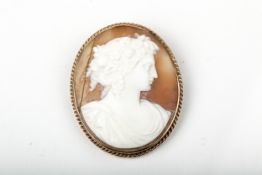 A vintage 9ct gold and oval shell cameo brooch.