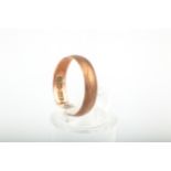 A late Victorian 9ct rose gold wedding band. Hallmarks for Birmingham 1893, 4.2mm wide, size L+, 1.