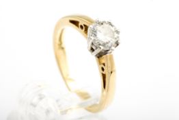 A diamond solitaire ring. The round brilliant approx. 0.