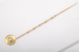 A 9ct gold and diamond single stone stick pin, hallmarks for London 1983. 2.