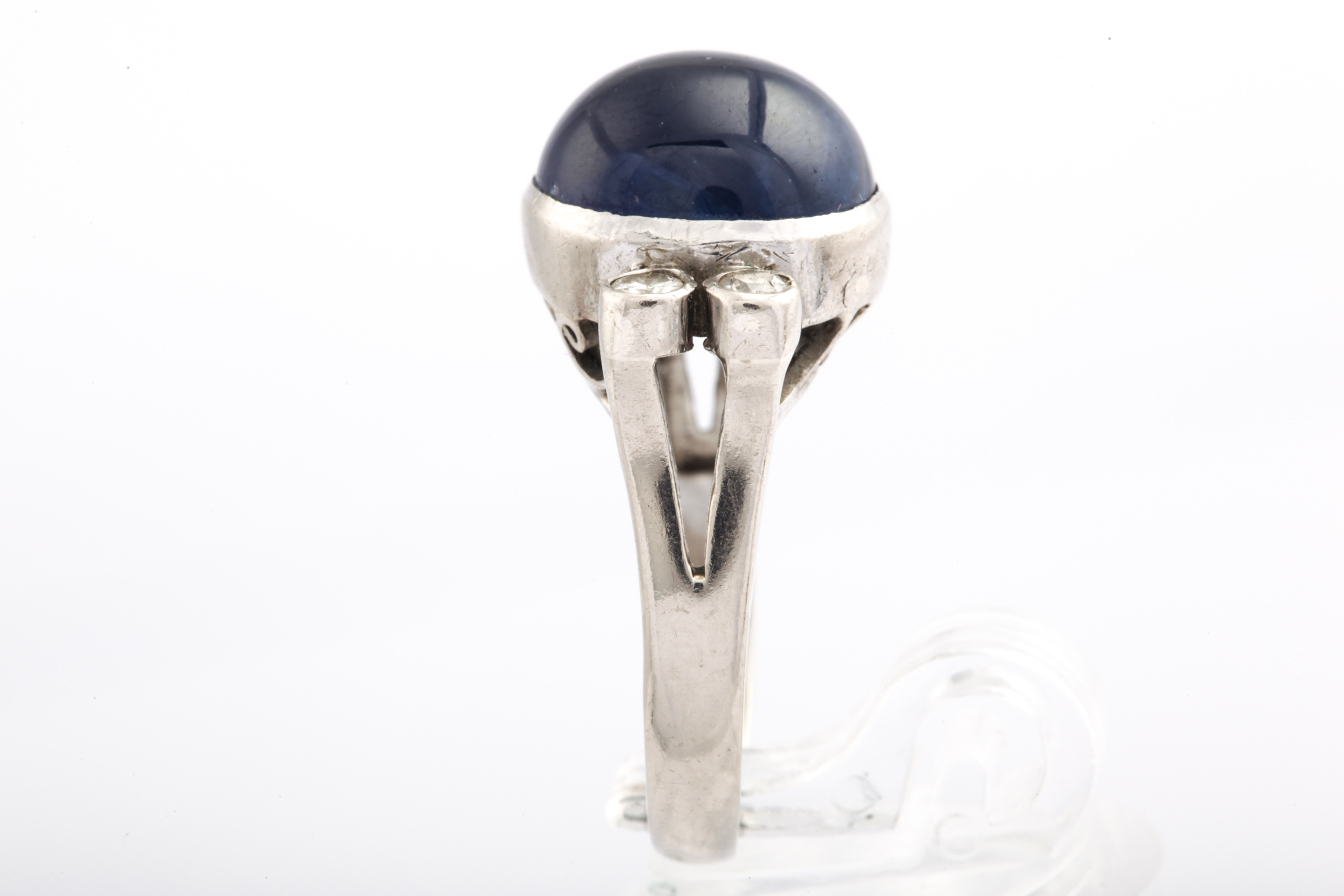 A mid-20th century cabochon sapphire and diamond dress ring. - Image 3 of 4