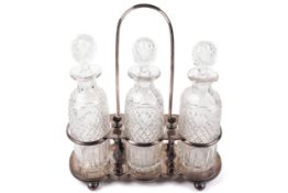 An early 20th century plated three bottle tantalus.