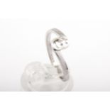 Gucci, an Italian 18ct white gold cross-over ring.