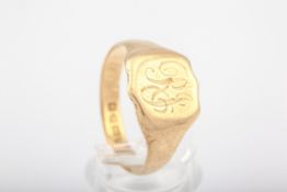 An Edwardian 18ct gold shaped-oblong signet ring.