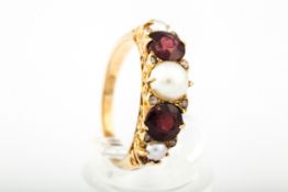 An early/mid-20th century gold, garnet and cultured-half-pearl five stone half-hoop ring.