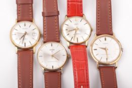 Four vintage gentleman's gold-plated round wristwatches.