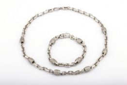 A vintage Italian diamond-set curb link bracelet and a matching necklace.