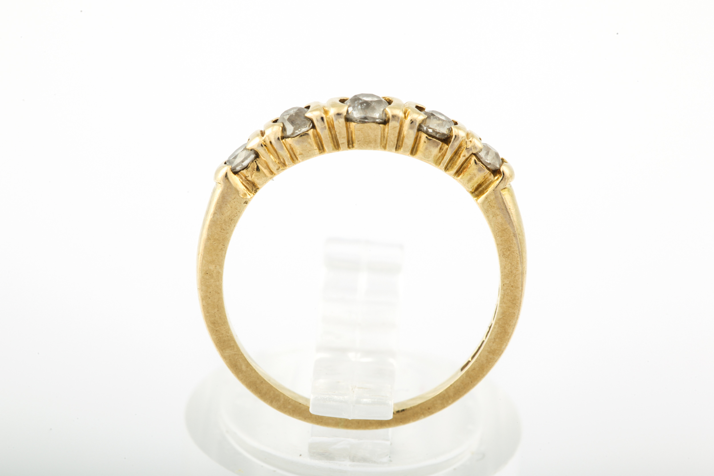 A modern 18ct gold and diamond five stone ring. The graduated old-cut stones approx. 0. - Image 6 of 10