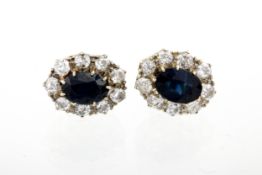 A pair of vintage gold, sapphire and diamond oval cluster stud earrings.