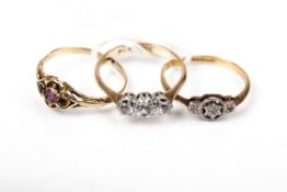 Three Victorian and later gold and gem set rings.