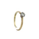 A mid-20th century gold and diamond solitaire ring. The round brilliant approx. 0.