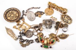 A collection of niello, damascened and Egyptian themed costume jewellery.