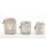 Three Victorian and later silver vesta or match cases.