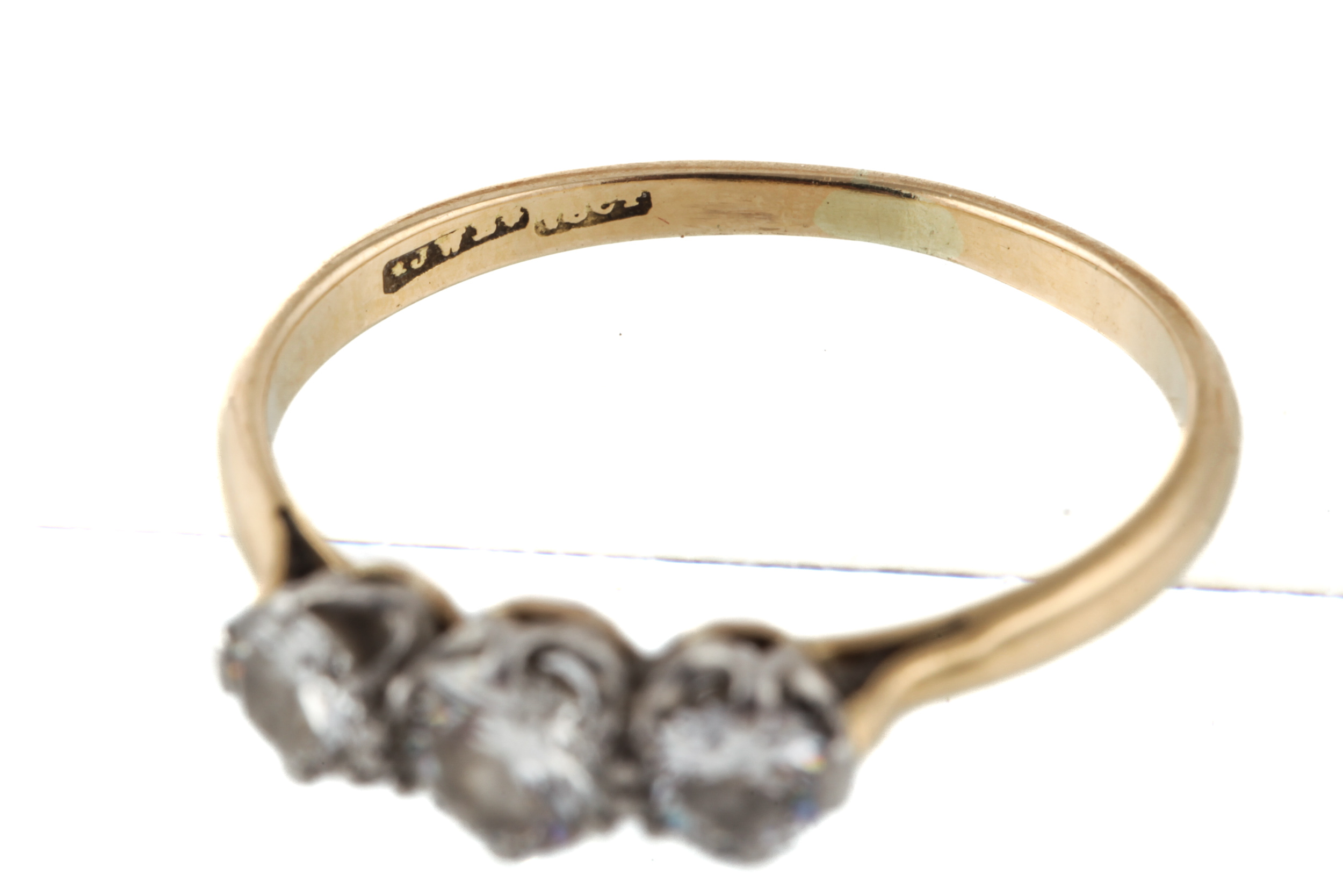An early/mid-20th century gold and diamond three stone ring. - Image 4 of 5