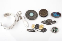 A small collection of Art Nouveau and Arts and Crafts style jewellery.