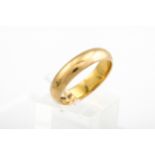 A vintage 22ct gold D-section wedding band. Hallmarks for Birmingham 1957, 4.