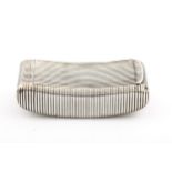 A George III silver reeded concave oblong snuff box.