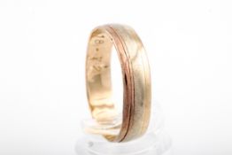 A vintage 9ct bi-colour gold broad wedding band, hallmarks for London 1984, 5.