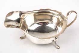 A silver sauce boat.