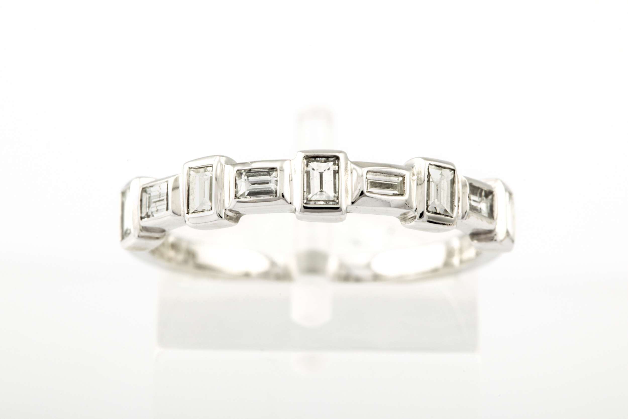 A modern 14ct white gold and diamond half-hoop ring. - Image 3 of 5