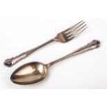 A silver christening fork and spoon.