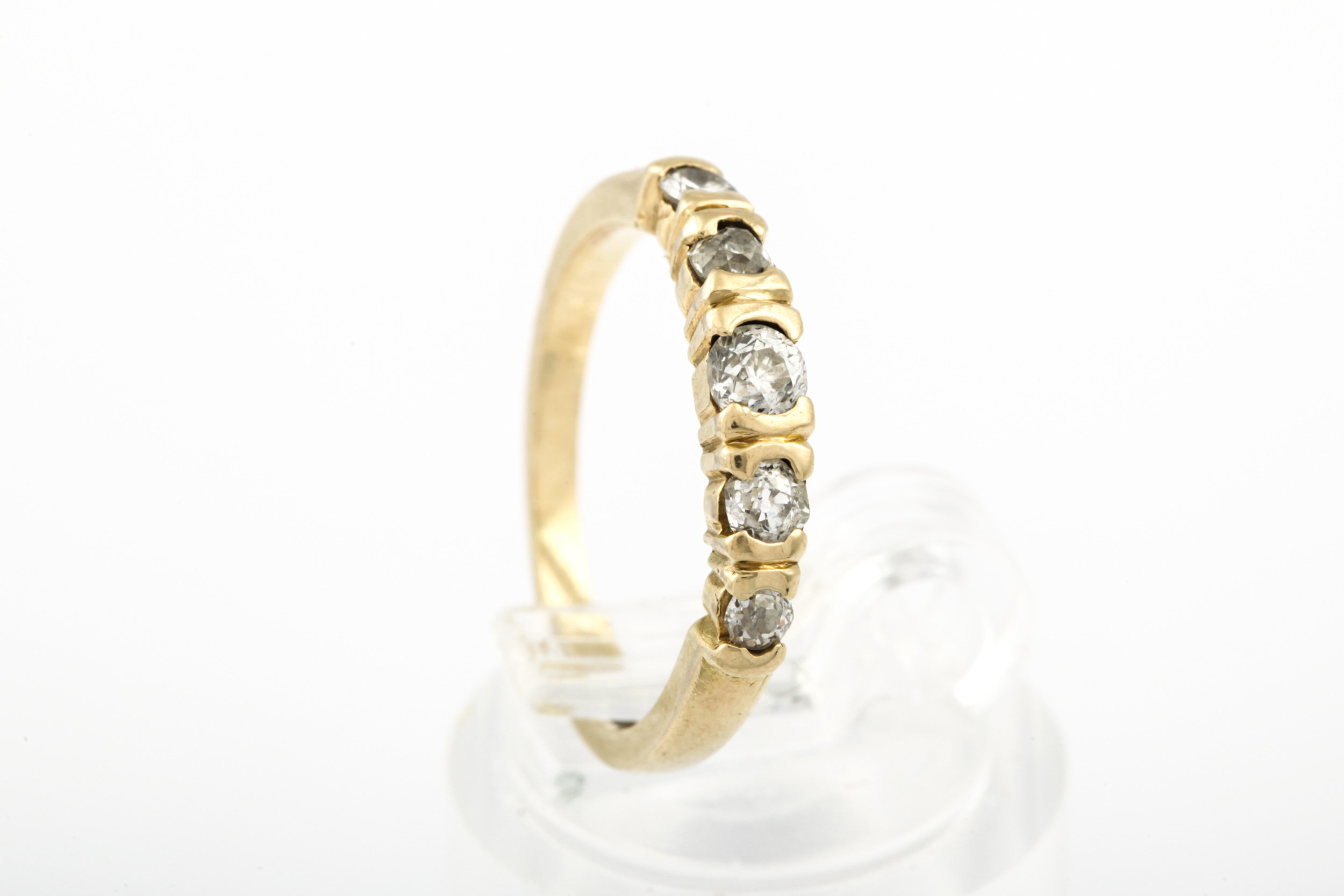 A modern 18ct gold and diamond five stone ring. The graduated old-cut stones approx. 0. - Image 5 of 10