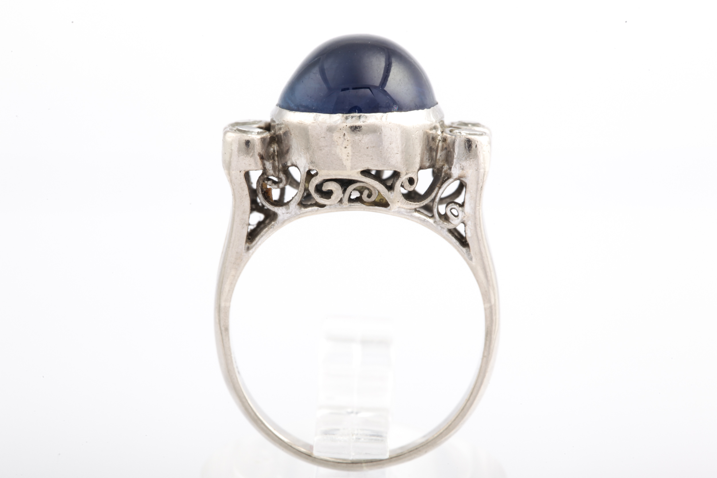 A mid-20th century cabochon sapphire and diamond dress ring. - Image 2 of 4