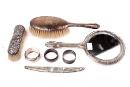 A silver mounted part dressing table set and other items.