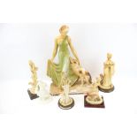 A group of assorted models of women with Afghan hounds. Including Royal Worcester 'Clara' 1925. Max.
