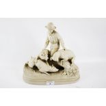 A 19th century Copeland parian ceramic statue of a 'boy and dogs' (AF).