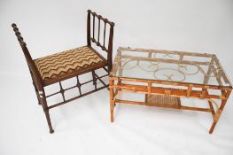 A circa 1900 Arts and Crafts Mackmurdo form upholstered oak stool and a bamboo glass top coffee