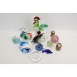 A collection of assorted glass paperweights and ornaments. Including fish and a cockerel, etc. Max.