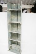 A free-standing bookcase.
