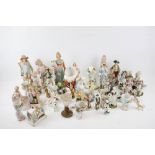 A collection of continental porcelain figures.