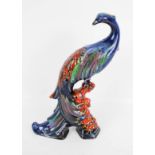 A signed Anita Harris art pottery 'Peacock' figure.