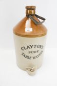 A vintage stoneware flagon jar, 'Clayton's'.