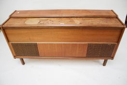 A mid-century modern teak radiogram cabinet.