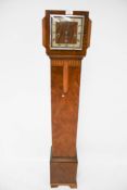 An Art Deco oak 'grand mother' long case clock.