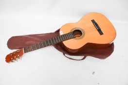A Classical Spanish acoustic guitar. Comes with a carry case.