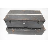 Two large vintage black painted tin storage trunks. Max.