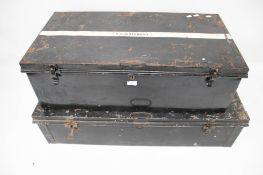 Two large vintage black painted tin storage trunks. Max.