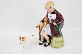 A limited edition Royal Doulton figure and a Beswick dog. 'The Girl Evacuee' HN3203, no.