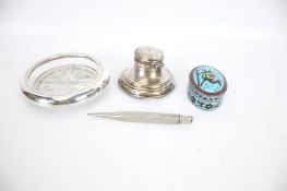 A group of silver collectables including ink well,